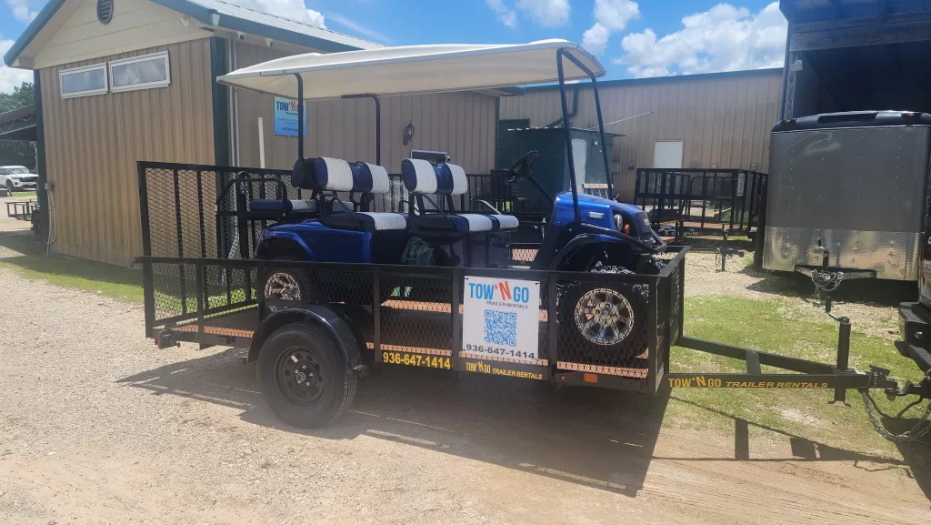 golf cart secured on a 6x12 utility trailer rental in Montgomery TX
